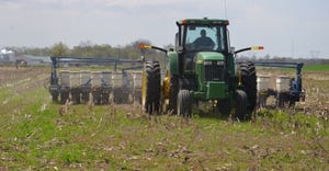 tractor and planter in no-till field