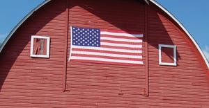 U.S. flag on red barn