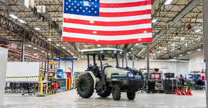 Monarch tractor under U.S. flag