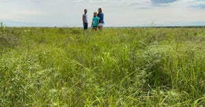 Elizabeth Kusmaul, and her children, show Flint Hills grasslands conservation work