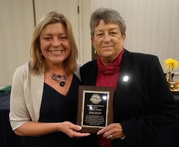 Kansas Agri-Women member Jean Goslin of Dwight,  receives the LEAVEN award from LEAVEN Committee Chair Kim Schmuhl