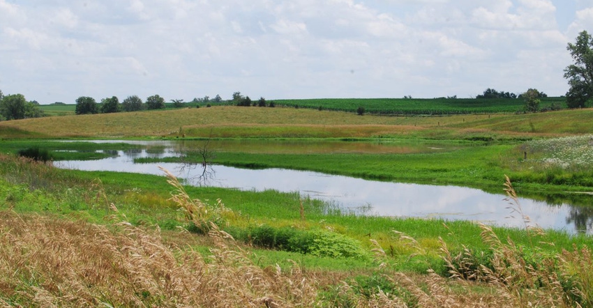 farmland with a pond