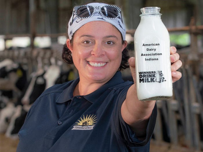 Jill Houin holding bottle of milk
