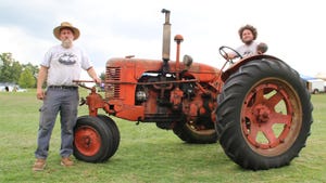 Jon Theissen, and his son, Erik, with their 1947 Case model SC tractor