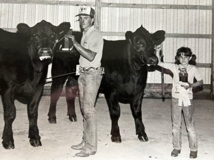 Michael and DeEtta Viets showing steers Michael and DeEtta Viets showing steers