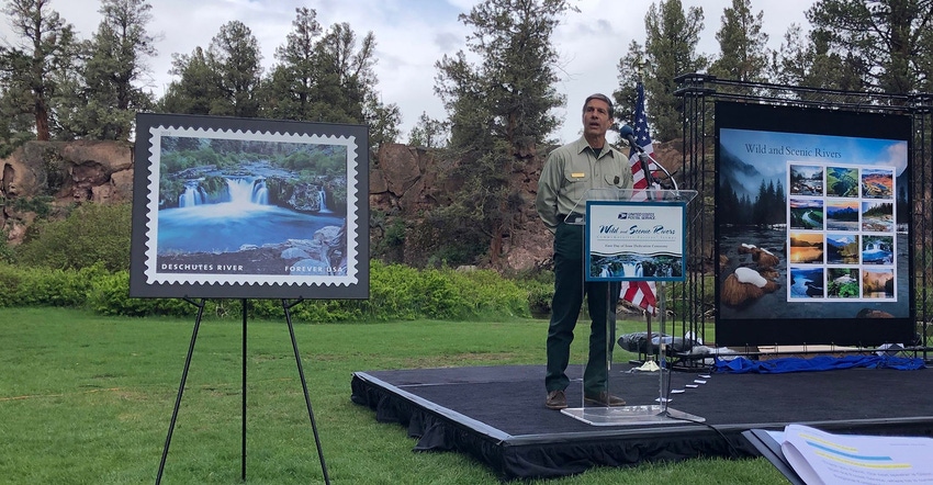 Pacific Northwest Regional Forester Glen Casamassa speaks at an event for the Wild and Scenic River stamp series