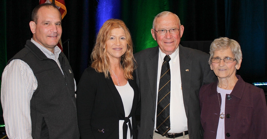 : Everett and Rudy Forkner flanked by their daughter Cindy Wyant and her husband Mike celebrate his induction into the Nation