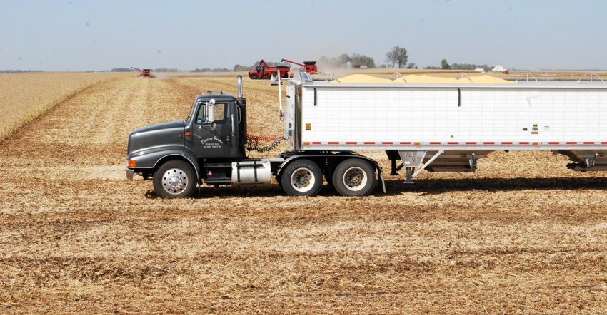 semi in the field during harvest