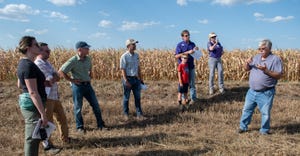 Moundridge, Kan., farmer Ray Flickner  hosting a group of earth scientists from NASA