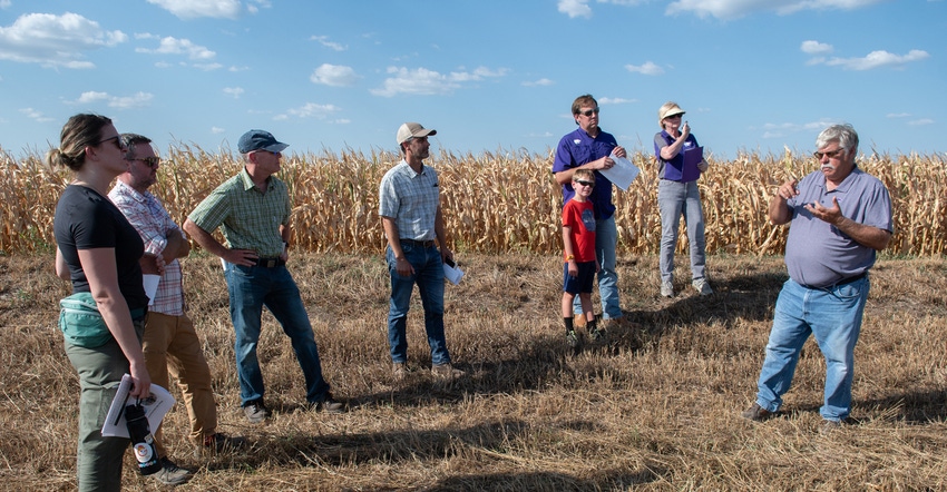 Moundridge, Kan., farmer Ray Flickner hosting a group of earth scientists from NASA Moundridge, Kan., farmer Ray Flickner hosting a group of earth scientists from NASA