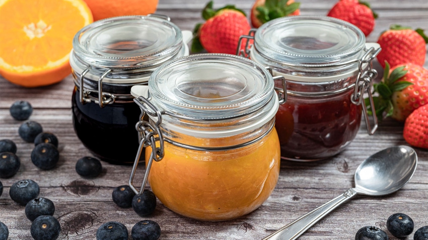 Assortment of homemade jams in glass jars
