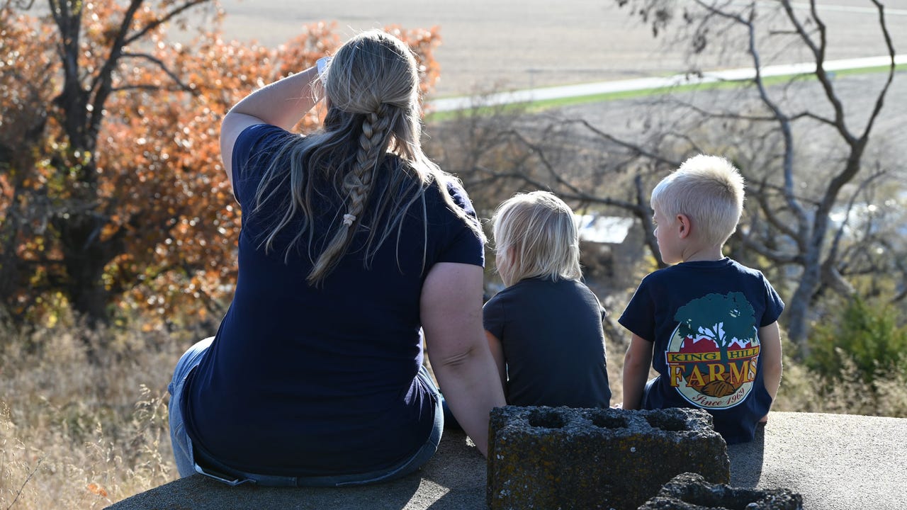 Photos by Pam Caraway - Lydia Wagy overlooks King Hill Farms with her young children Elsa and Lucas