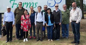 Shelly Hartmann, owner of True Blue Farm LLC in Grand Junction (fourth from left) visited with Vietnamese officials during th