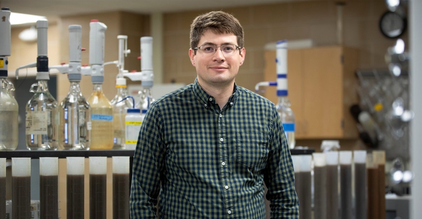 Andrew Stammer poses in University of Wisconsin-Madison Soil and Forage Analysis Lab