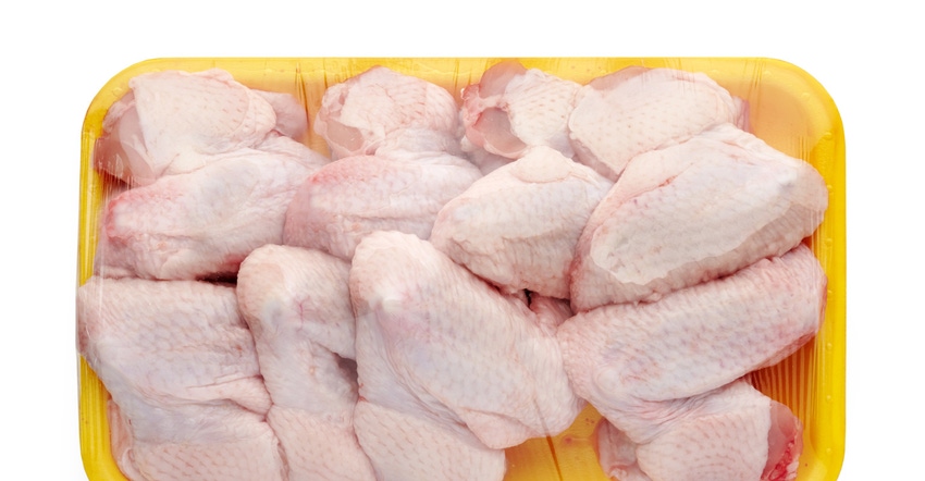 Raw, packaged chicken wings Raw, packaged chicken wings