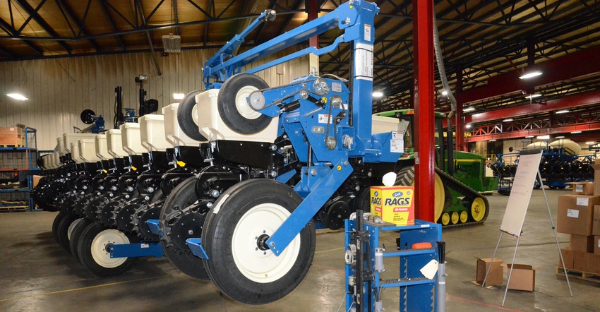 A planter undergoes a significant workover by folks from many Kinze departments