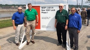 Marty Marr, Bill Leigh, Kenny Hartman and Randy DeSutter, Woodhull in front of sign at Lock 25 groundbreaking