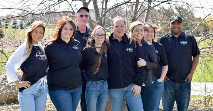 Family members and employees of Martin Family Farms in Warren County, Ind.