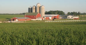 red barns, silos, white house -dairy farm 