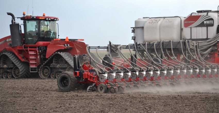 large tractor pulling a 36-row planter 