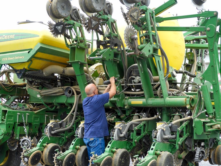 Bob Shearer, a 2018 Mid-Atlantic Master Farmer, inspects planting equipment