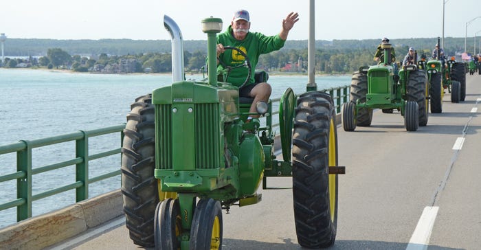 1,370 antique tractors paraded from Mackinaw City, Mich., across the Mackinac Bridge and into the Upper Peninsula town of St.