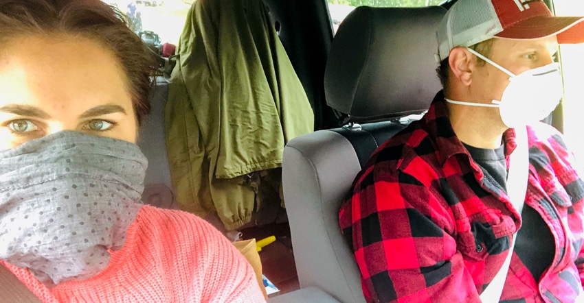 Shelby Watson-Hampton and her husband wear face mask in the car Shelby Watson-Hampton and her husband wear face mask in the car