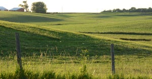 fence and pasture on farmland