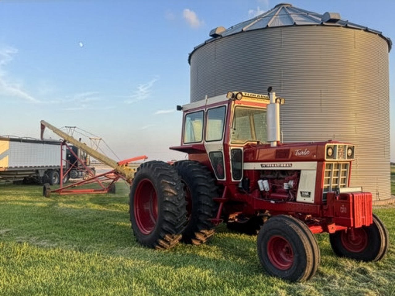 Gavin Spores' iconic IH 1066 powers an auger operation in Martinsburg, Missouri