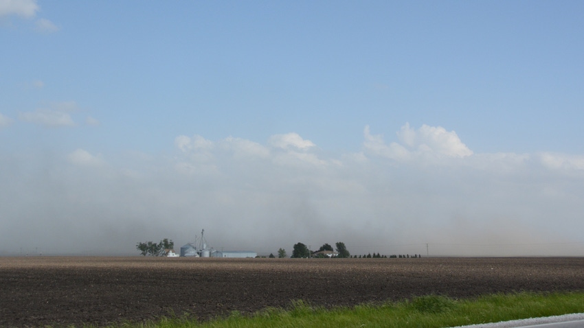 wind kicking up loose dust into air