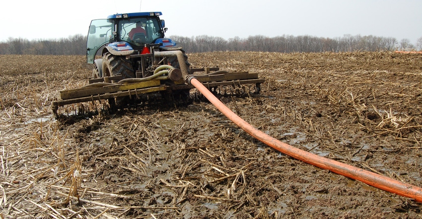 liquid manure being applied to field