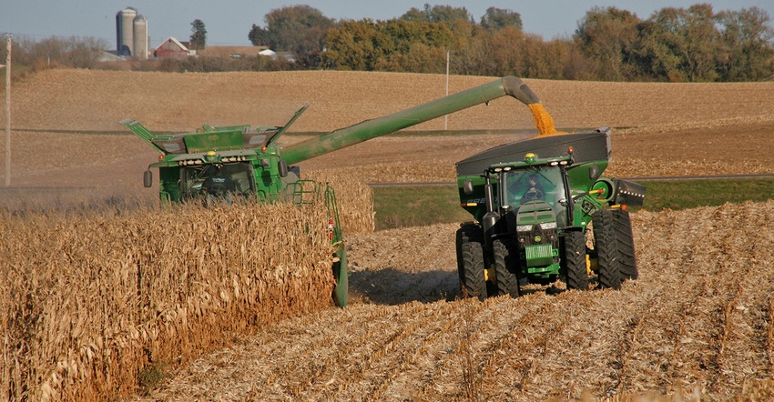 harvesting corn with John Deere equipment