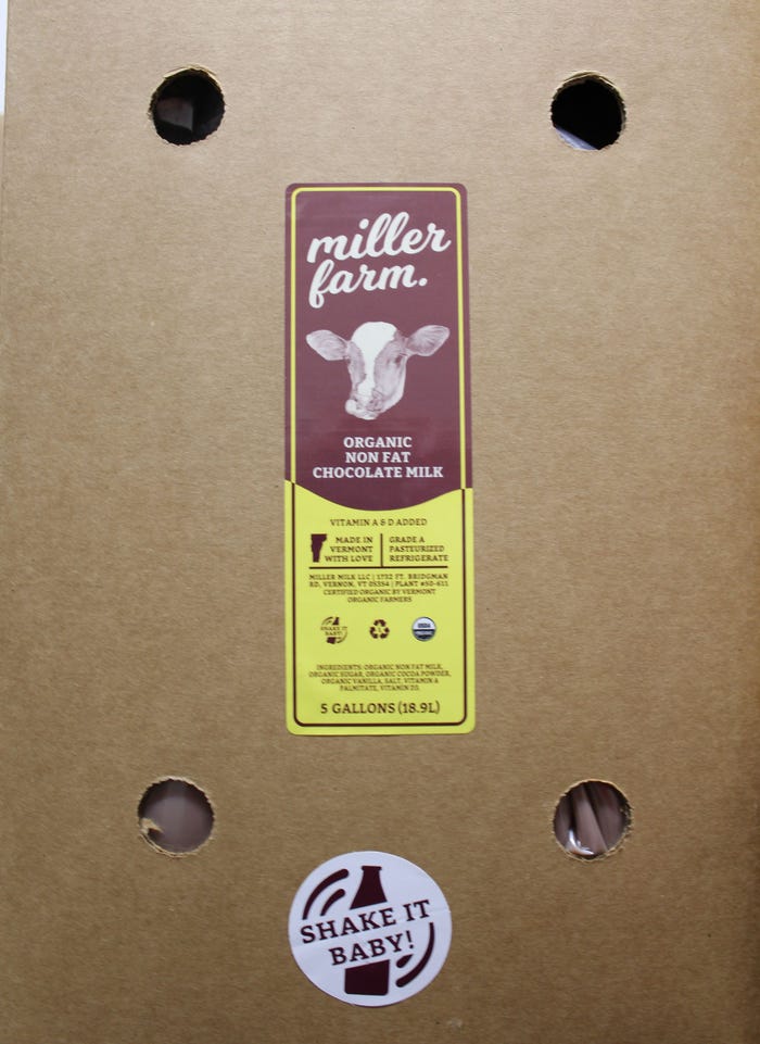 Susan Harlow - The outside panel of a box with a chocolate milk label and a sticker that reads 