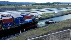 A cargo ship going through the Panama Canal