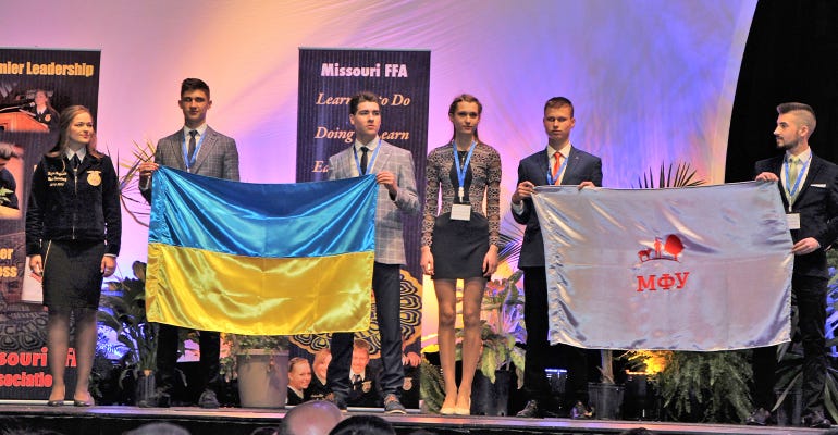 Students and representatives from the Futures Farmers of Ukraine on stage at the Missouri FFA Convention