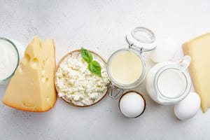 Assorted dairy products including milk, cream and cheese.
