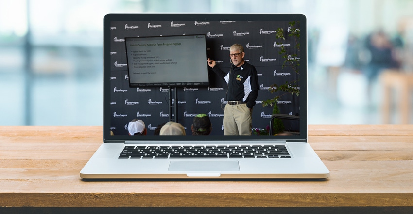 Bryce Knorr talking at Farm Progress show on laptop screen
