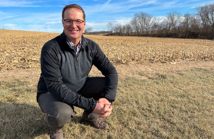 Jeff Jorgenson at edge of harvested corn field
