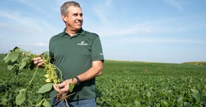Dan Farney in a soybean field