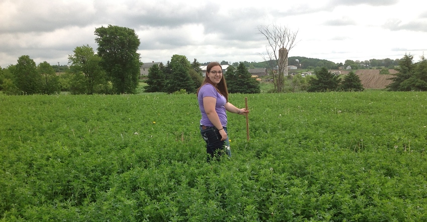 Woman in alfalfa field