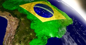 Brazil with embedded flag on planet surface during sunrise. 3D illustration with highly detailed realistic planet surface and