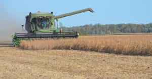 combine harvesting soybeans