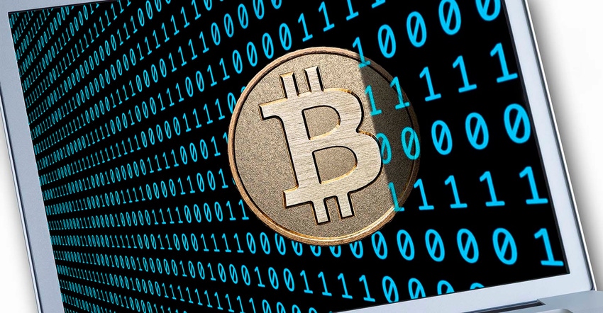 Bitcoin together with binary bode on a notebook display.