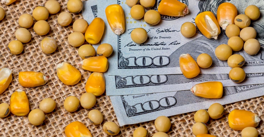 Corn and soybeans with money 