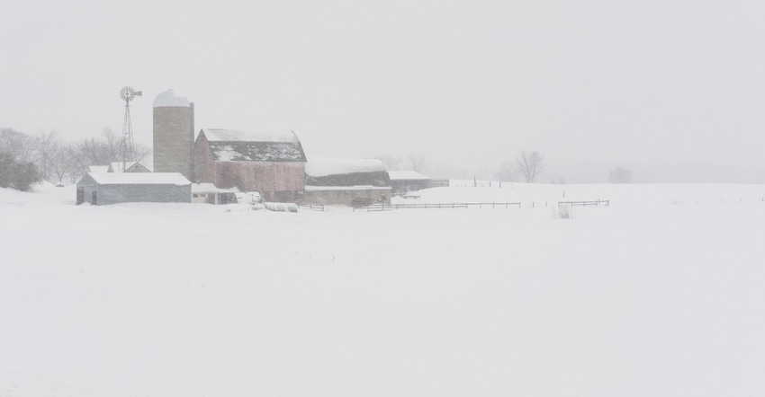 rural farm during snowstorm rural farm during snowstorm