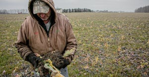 Jeff Duling examines soil