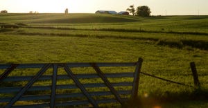 Rural sunrise with fenceline
