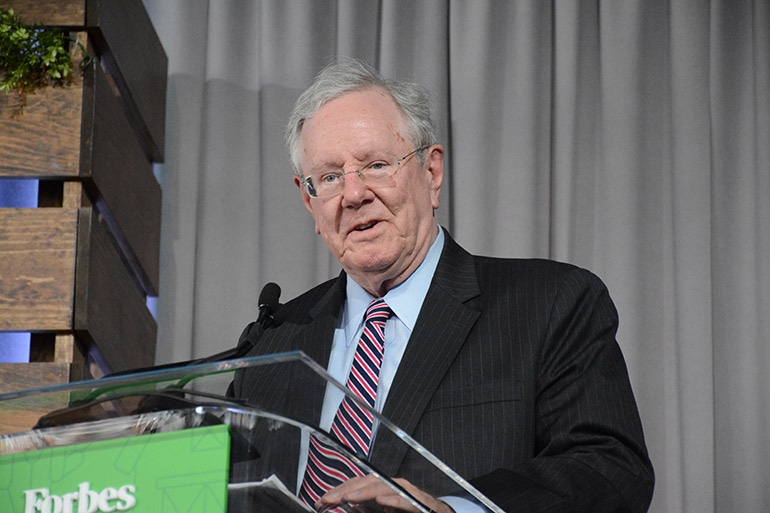 Steve Forbes at podium Steve Forbes at podium