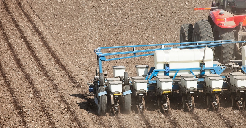 A low aerial view of row-crop planter