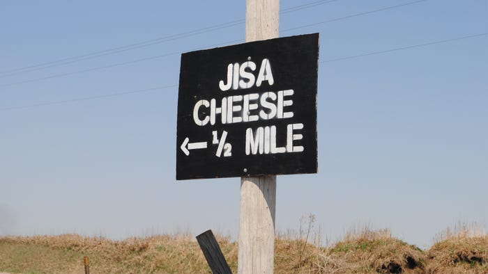 Jisa Cheese sign on telephone pole 